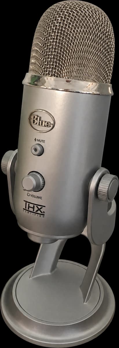 The silver microphone on its original stand.